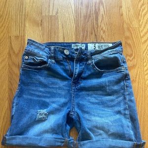 Medium wash medium length shorts
